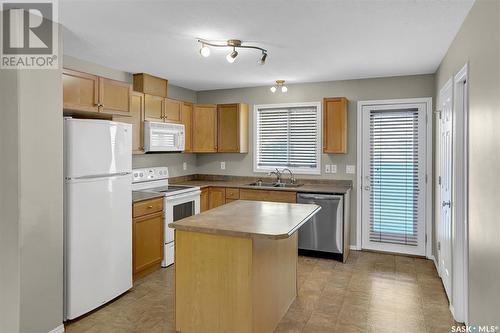 51 2801 Windsor Park Road, Regina, SK - Indoor Photo Showing Kitchen With Double Sink