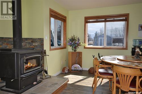 6 Bronco Drive, Big River Rm No. 555, SK - Indoor Photo Showing Dining Room With Fireplace