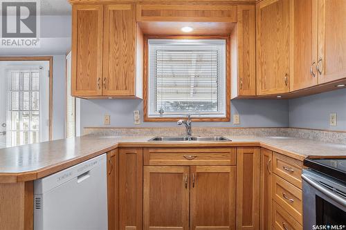 1335 Haslam Way, Saskatoon, SK - Indoor Photo Showing Kitchen With Double Sink