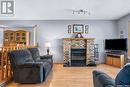 1335 Haslam Way, Saskatoon, SK  - Indoor Photo Showing Living Room With Fireplace 