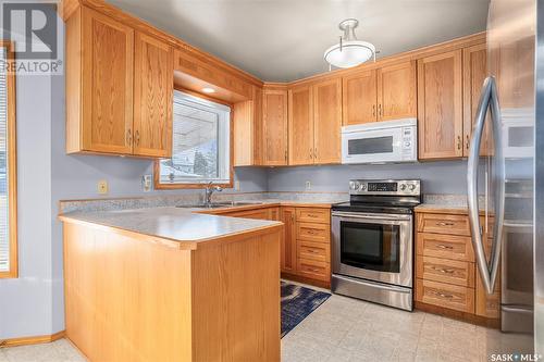 1335 Haslam Way, Saskatoon, SK - Indoor Photo Showing Kitchen With Double Sink