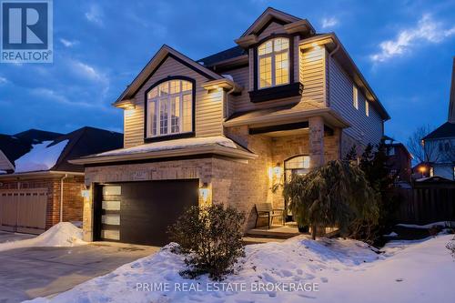 New black quiet motor garage doors in 2024 - 855 Oakcrossing Road, London, ON - Outdoor