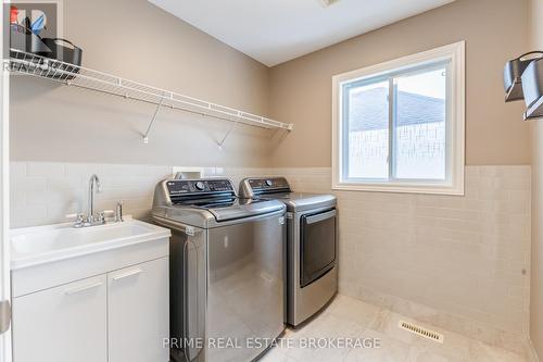 Upper level waterproofelaundry room - 855 Oakcrossing Road, London, ON - Indoor Photo Showing Laundry Room