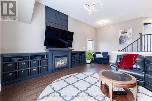 Second level living room w/ gas fireplace - 855 Oakcrossing Road, London, ON - Indoor Photo Showing Living Room With Fireplace