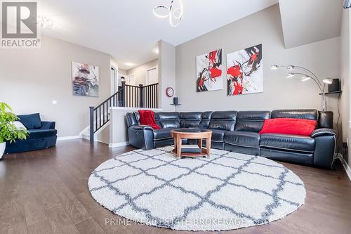 Second level living room w/ gas fireplace - 855 Oakcrossing Road, London, ON - Indoor Photo Showing Living Room