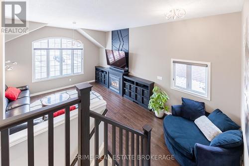 Second level living room w/ gas fireplace - 855 Oakcrossing Road, London, ON - Indoor Photo Showing Other Room