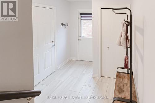 Mudroom & exterior side entrance w/ garage access - 855 Oakcrossing Road, London, ON - Indoor Photo Showing Other Room