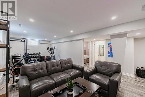 Lower level living room 3 w/ electric fireplace - 855 Oakcrossing Road, London, ON - Indoor Photo Showing Living Room