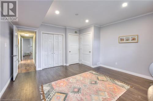 Bedroom featuring recessed lighting, visible vents, baseboards, ornamental molding, and dark wood finished floors - 42 Culpepper Drive, Waterloo, ON - Indoor Photo Showing Other Room