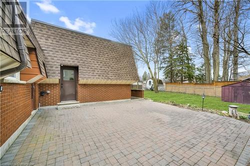 View of patio / terrace featuring a storage shed, an outdoor structure, and fence - 42 Culpepper Drive, Waterloo, ON - Outdoor