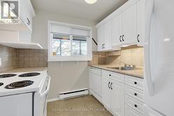 Updated bright white kitchen - 