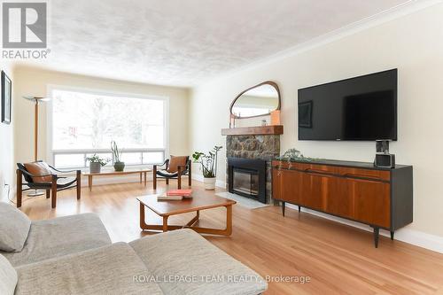 828 Kingsmere Avenue, Ottawa, ON - Indoor Photo Showing Living Room With Fireplace