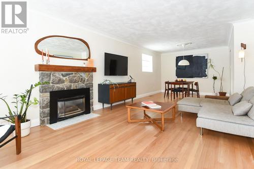 828 Kingsmere Avenue, Ottawa, ON - Indoor Photo Showing Living Room With Fireplace