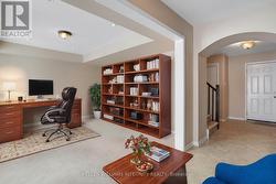 Virtually Staged Main Floor Den/Office - 