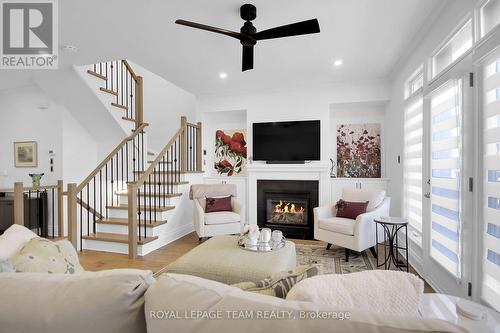 The fireplace is just too inviting - 400 Berkley Avenue, Ottawa, ON - Indoor Photo Showing Living Room With Fireplace