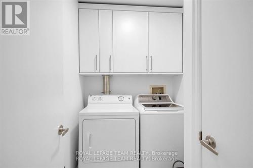 3rd Level Laundry with storage and linen closet - 400 Berkley Avenue, Ottawa, ON - Indoor Photo Showing Laundry Room