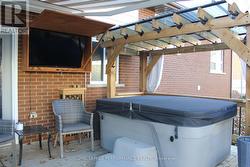 Backyard pergola and T.V. encloser - 