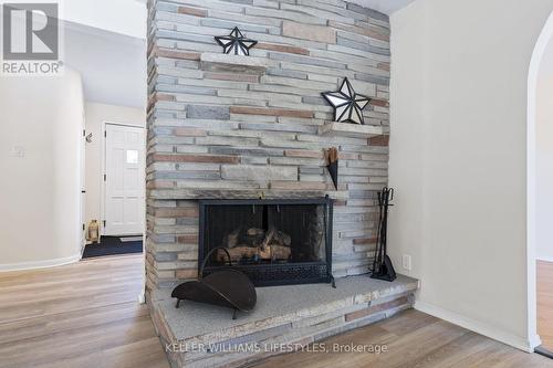 Wood burning fireplace - 67 Britannia Avenue, London, ON - Indoor Photo Showing Living Room With Fireplace