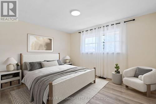 Virtually staged primary suite - 67 Britannia Avenue, London, ON - Indoor Photo Showing Bedroom