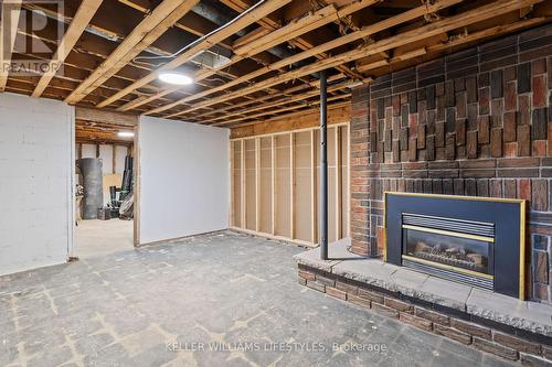 67 Britannia Avenue, London, ON - Indoor Photo Showing Basement With Fireplace