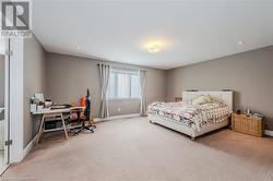 Bedroom with recessed lighting, baseboards, and carpet - 