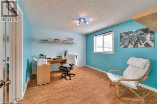 Office with baseboards, a textured ceiling, and wood finished floors - 105 Sabrina Crescent, Kitchener, ON - Indoor Photo Showing Other Room