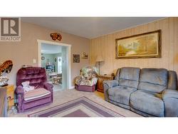 living room showing access to kitchen - 