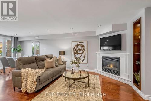 Gas Fireplace - 935 Lovingston Crescent, Mississauga, ON - Indoor Photo Showing Living Room With Fireplace