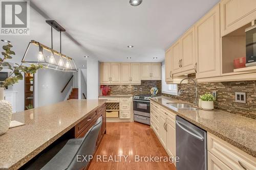 935 Lovingston Crescent, Mississauga, ON - Indoor Photo Showing Kitchen With Stainless Steel Kitchen With Double Sink