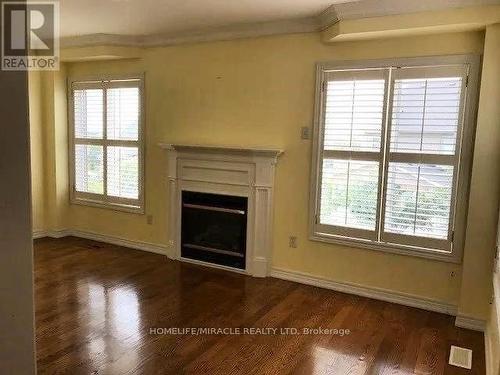 874 Knotty Pine Grove, Mississauga, ON - Indoor Photo Showing Living Room With Fireplace