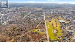 Aerial Photo With Golf Course Across Road - 