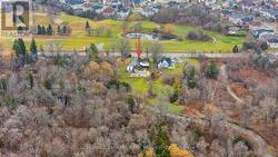 Aerial Photo With Golf Course Across Road - 