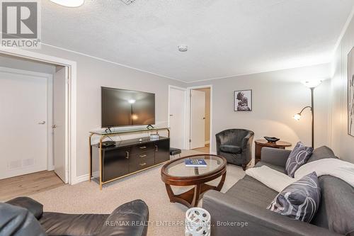 Lower level has large family room - 2000 Silverberry Crescent, Mississauga, ON - Indoor Photo Showing Living Room