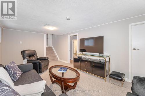 Ideal for family, a playroom or flex space - 2000 Silverberry Crescent, Mississauga, ON - Indoor Photo Showing Living Room