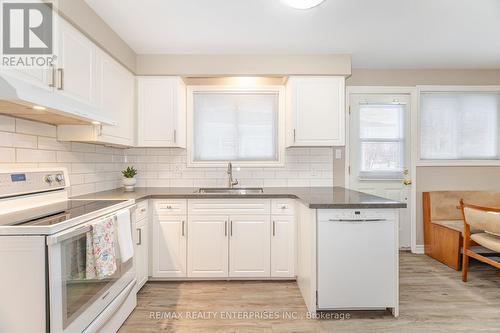 Kitchen features ample storage space - 2000 Silverberry Crescent, Mississauga, ON - Indoor Photo Showing Kitchen