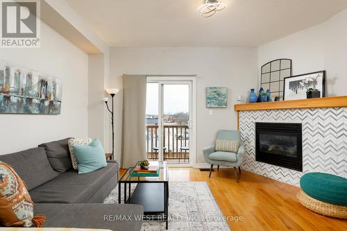 668 Rowley Common, Burlington, ON - Indoor Photo Showing Living Room With Fireplace