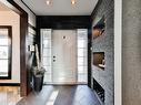 Hall d'entrée - 6680Z Boul. Laurier, Terrebonne (La Plaine), QC  - Indoor Photo Showing Other Room With Fireplace 