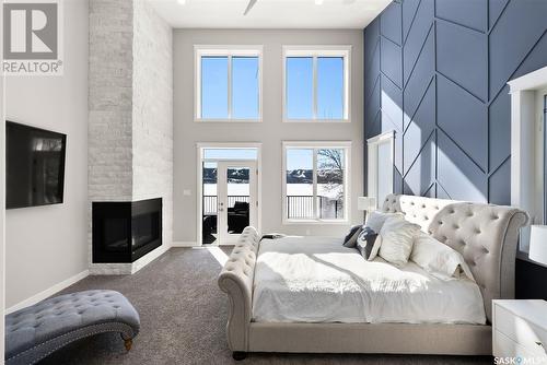 802 Groomes Vista Road, North Qu'Appelle Rm No. 187, SK - Indoor Photo Showing Bedroom With Fireplace