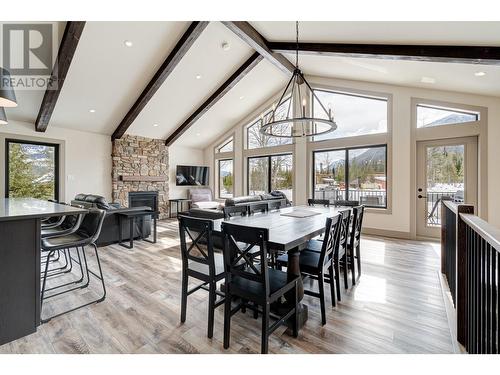 5545 Currie Bowl Way, Fernie, BC - Indoor Photo Showing Dining Room With Fireplace