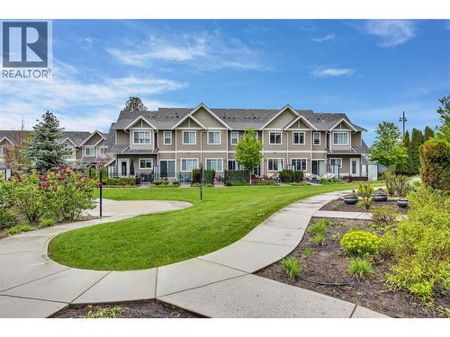 The Enclave is a wonderful Townhome community in the Lower Mission. - 600 Sherwood Road Unit# 55, Kelowna, BC - Outdoor With Facade