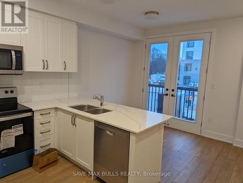 99 Roger Street, Waterloo, ON - Indoor Photo Showing Kitchen With Double Sink