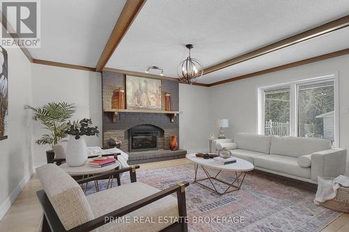 58 Andover Drive, London, ON - Indoor Photo Showing Living Room With Fireplace