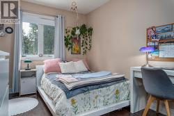 3rd bedroom also with hardwood flooring - 