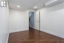 Basement with hardood flooring - 