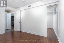 View to basement hallway and bedroom on right - 