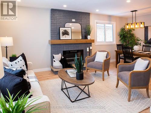 236 Tweedsmuir Avenue, London, ON - Indoor Photo Showing Living Room With Fireplace