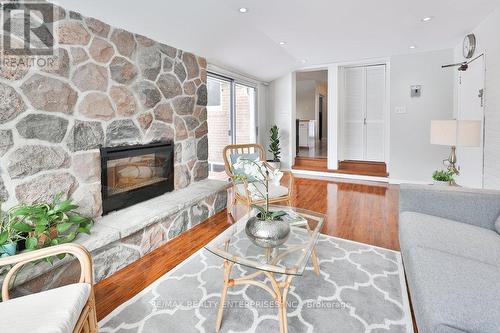 Laundry Room, Combined With Family Room On Main - 1169 Wildfield Crescent, Mississauga, ON - Indoor Photo Showing Living Room With Fireplace