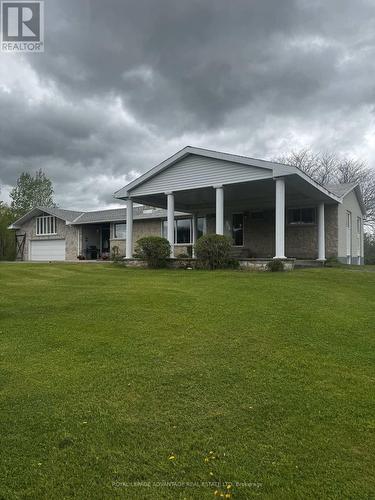 650 Christie Lake Road, Tay Valley, ON - Outdoor With Deck Patio Veranda With Facade