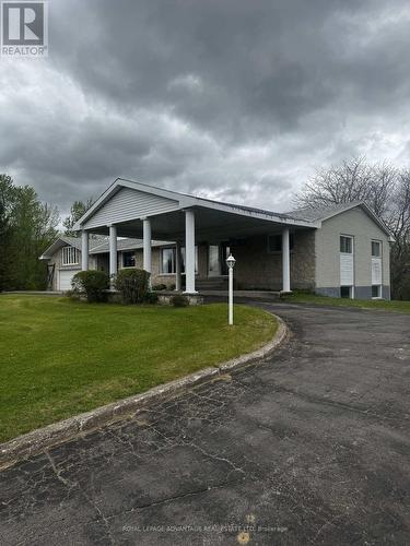 650 Christie Lake Road, Tay Valley, ON - Outdoor With Deck Patio Veranda With Facade