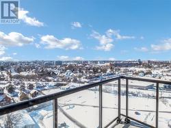 View of snow covered back of property - 